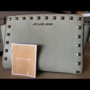 Michael Kors light blue studded crossbody.
